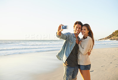 Buy stock photo Couple, selfie and happy for hug by sea for memory on vacation with care, love and mock up space. Man, woman and smartphone for photography, profile picture and mobile app at beach on social media