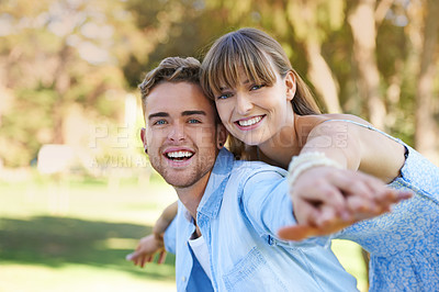 Buy stock photo Portrait, piggy back and couple in a park, love and happiness with marriage and romance. Face, man carrying woman or outdoor with fun or relationship with care or trust with smile or bonding together