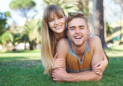 Buy stock photo Park, love and portrait of happy couple relax for outdoor sunshine, wellness and romantic date in nature. Happiness, commitment and young people bonding together on grass pitch, field or lawn