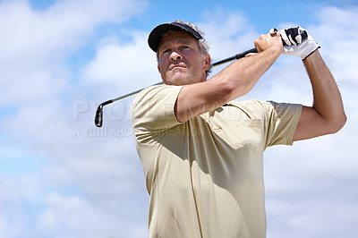 Buy stock photo Sport, man and golf outdoor with swing for playing, performance or game with fitness and wellness. Athlete, mature person and golfer with club, blue sky and exercise for recreation, workout and hobby