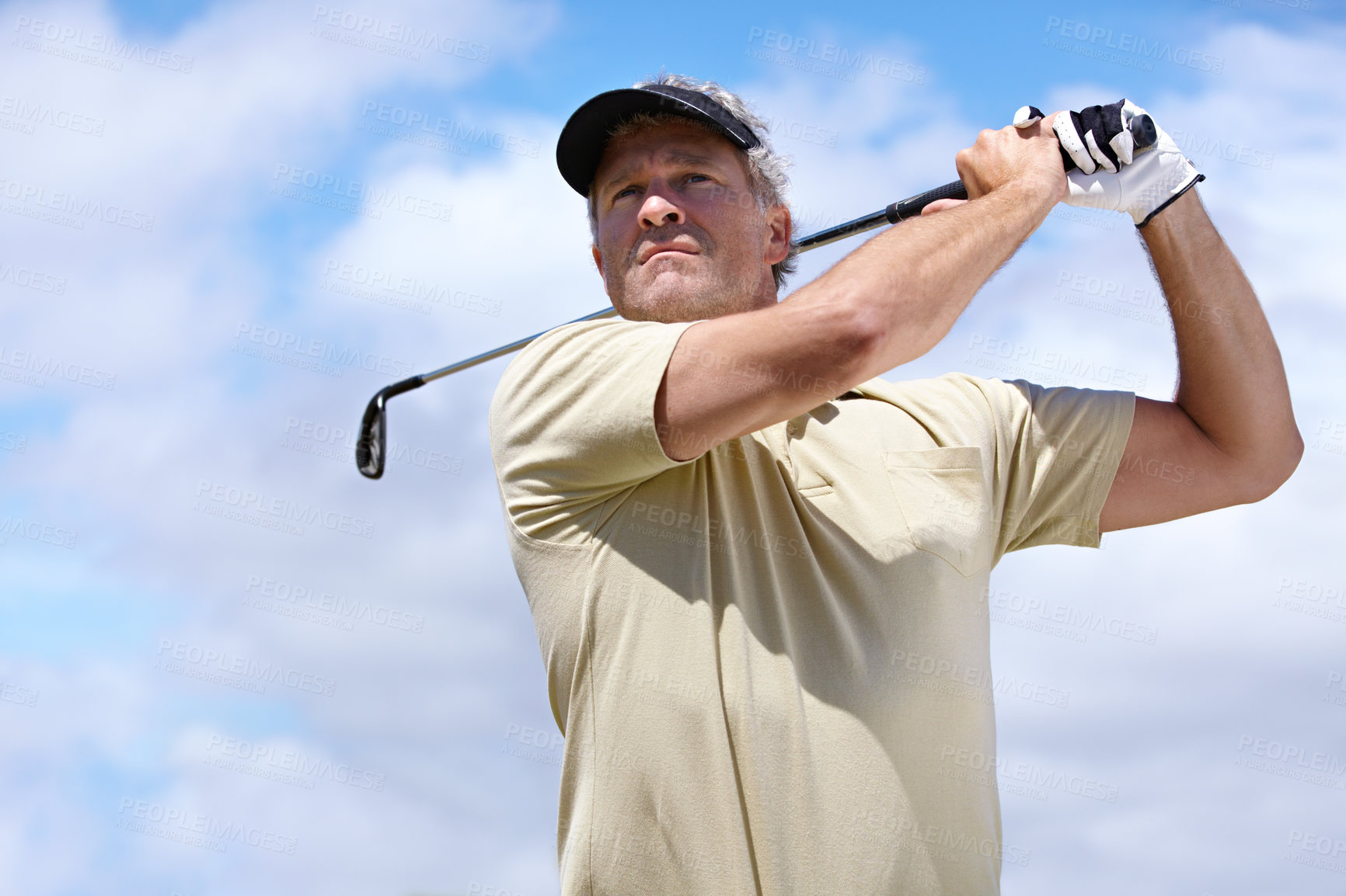 Buy stock photo Sport, man and golf outdoor with swing for playing, performance or game with fitness and wellness. Athlete, mature person and golfer with club, blue sky and exercise for recreation, workout and hobby