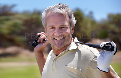 Buy stock photo Portrait of a mature man holding his golf club over his shoulders