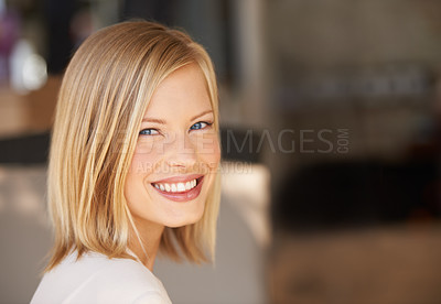 Buy stock photo Young woman, smile and portrait with space for mockup, blurred background and happiness at workplace. Girl, mock up and copyspace for promotion, logo and happy with motivation, confidence or pride