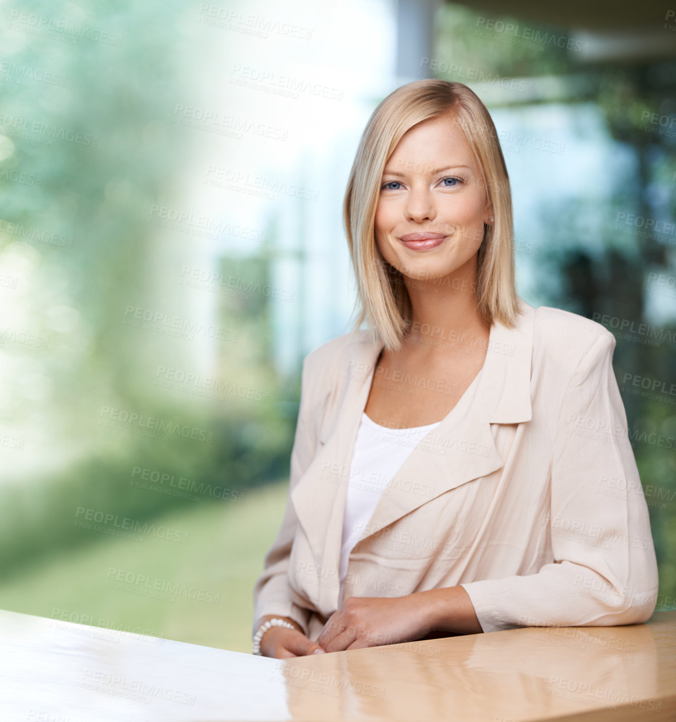 Buy stock photo Portrait, mockup and professional with a business woman at a desk in her office for company vision. Confident, happy and success with a young female employee looking ambitious while sitting at work