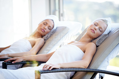 Buy stock photo Holiday, women sleeping on bed at spa vacation and holistic treatment or wellness procedure lifestyle. Skincare or self care, relaxed people sitting on couch and relaxation for stress relief