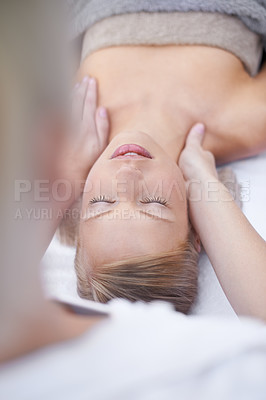 Buy stock photo Young woman, relax and massage in spa for health, wellness and peace with hands for shoulder pain. Person, comfort or release of muscle tension by masseuse, body treatment or detox in resort for zen