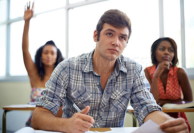Buy stock photo Students, questions and learning in classroom for education, language development and knowledge in high school. Young people raise hands at desk for answer, quiz and test notes with information 