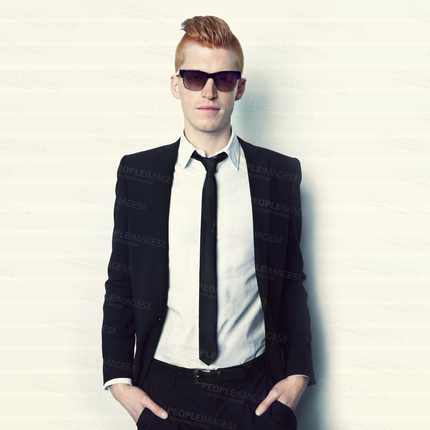 Buy stock photo Fashion, suit and portrait of a man in a studio with sunglasses and a stylish formal outfit.Young, cool and handsome male model with elegant trendy style and confidence isolated by a white background