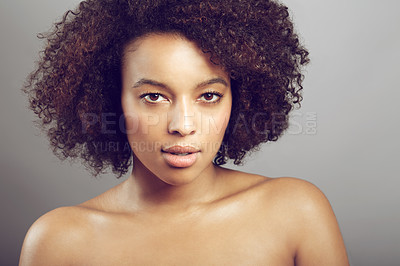 Buy stock photo Serious, portrait and a black woman for skincare and beauty isolated on studio background. Wellness, dermatology and face of an African girl with a glow from care for skin and cosmetic salon results