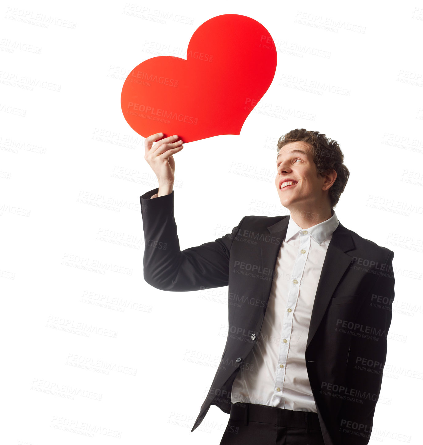 Buy stock photo A young man holding a heart symbol in front of a white background