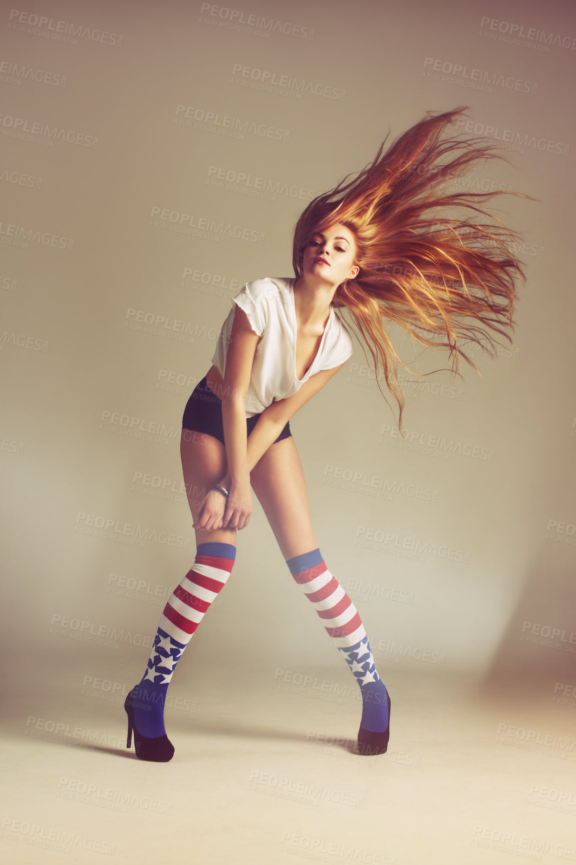 Buy stock photo Full length shot of an attractive and funky young woman posing in the studio