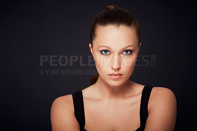 Buy stock photo Portrait, skincare and woman in studio for dermatology, shine or wellness treatment on black background. Cosmetic, beauty or face of female model with glowing skin confidence, cosmetology and serious