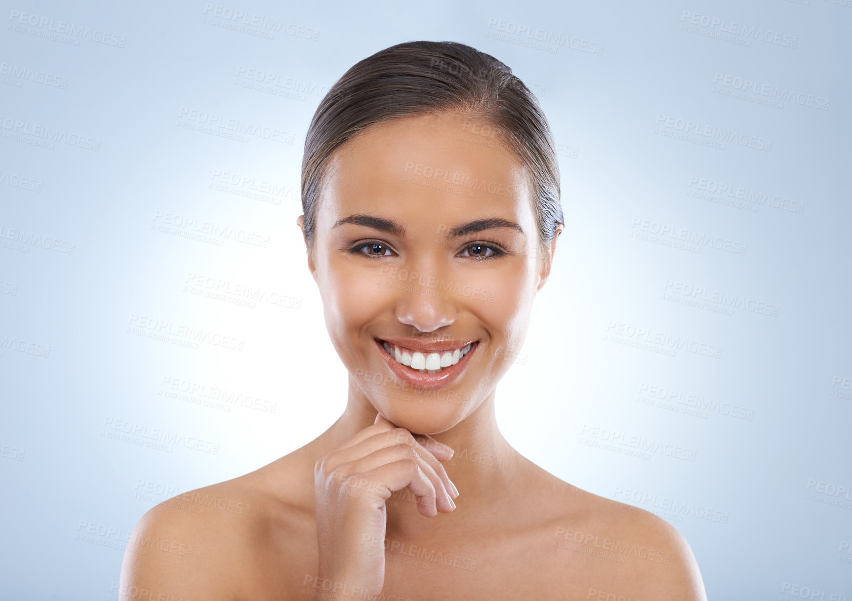 Buy stock photo Happy woman, portrait and skincare in natural beauty, makeup or cosmetics on a blue studio background. Face of young female person or model smile for skin, glow or facial treatment on mockup space