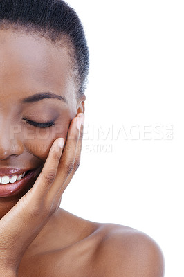 Buy stock photo Face, smile and skincare natural black woman in studio isolated on white background fpr spa treatment. Half, beauty or wellness and happy young model touching face with hands for dermatology