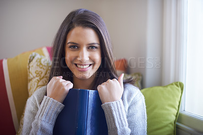 Buy stock photo Woman, portrait and reading book to relax at home, literature and fiction novel for knowledge. Female person, student and information for learning, comfortable and fantasy story on weekend in house