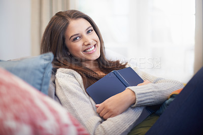 Buy stock photo Relaxing with her favorite book