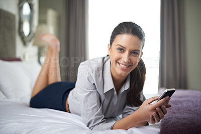 Buy stock photo Relax, phone or portrait of businesswoman in bed on social media for internet for website notification or news. Smile happy or lady in hotel texting online on mobile app to search for a meme post