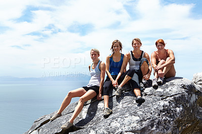 Buy stock photo Happy, friends and portrait of women on mountain cliff for rock climbing, freedom and travel vacation. Sports, hiking and adventure with people on rock in nature for trekking, training and mockup