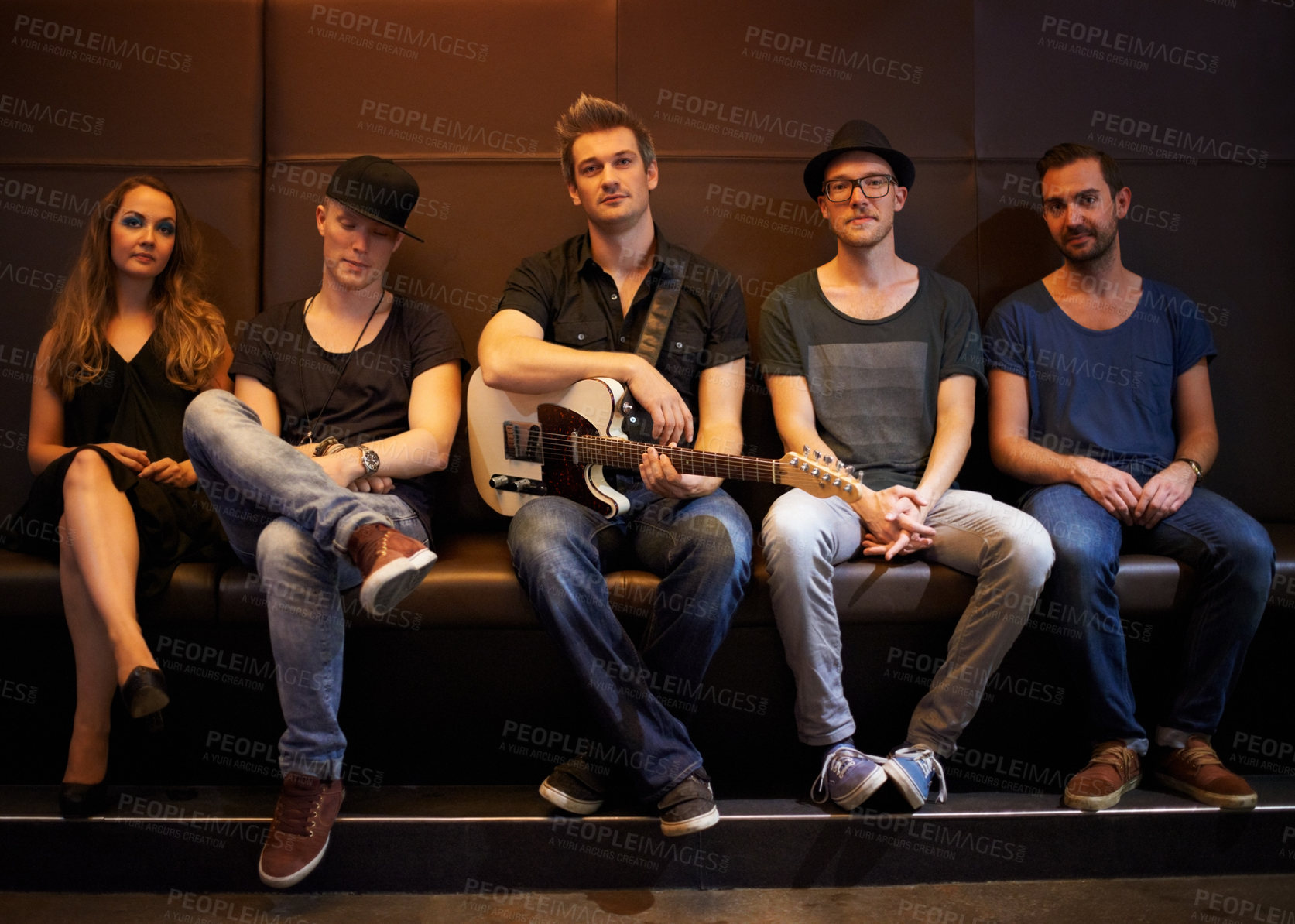 Buy stock photo A band posing for a photo before a big show. This concert was created for the sole purpose of this photo shoot, featuring 300 models and 3 live bands. All people in this shoot are model released.