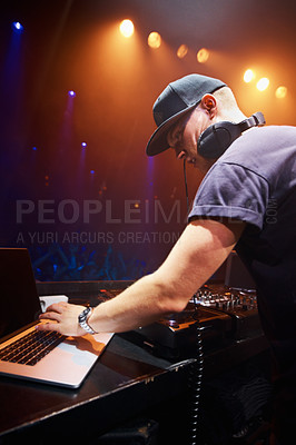 Buy stock photo DJ, man and laptop at nightclub for concert with spotlights, turntables and live music show. Professional person with crowd, playlists and mixing deck for party, rave or festival in Portugal 