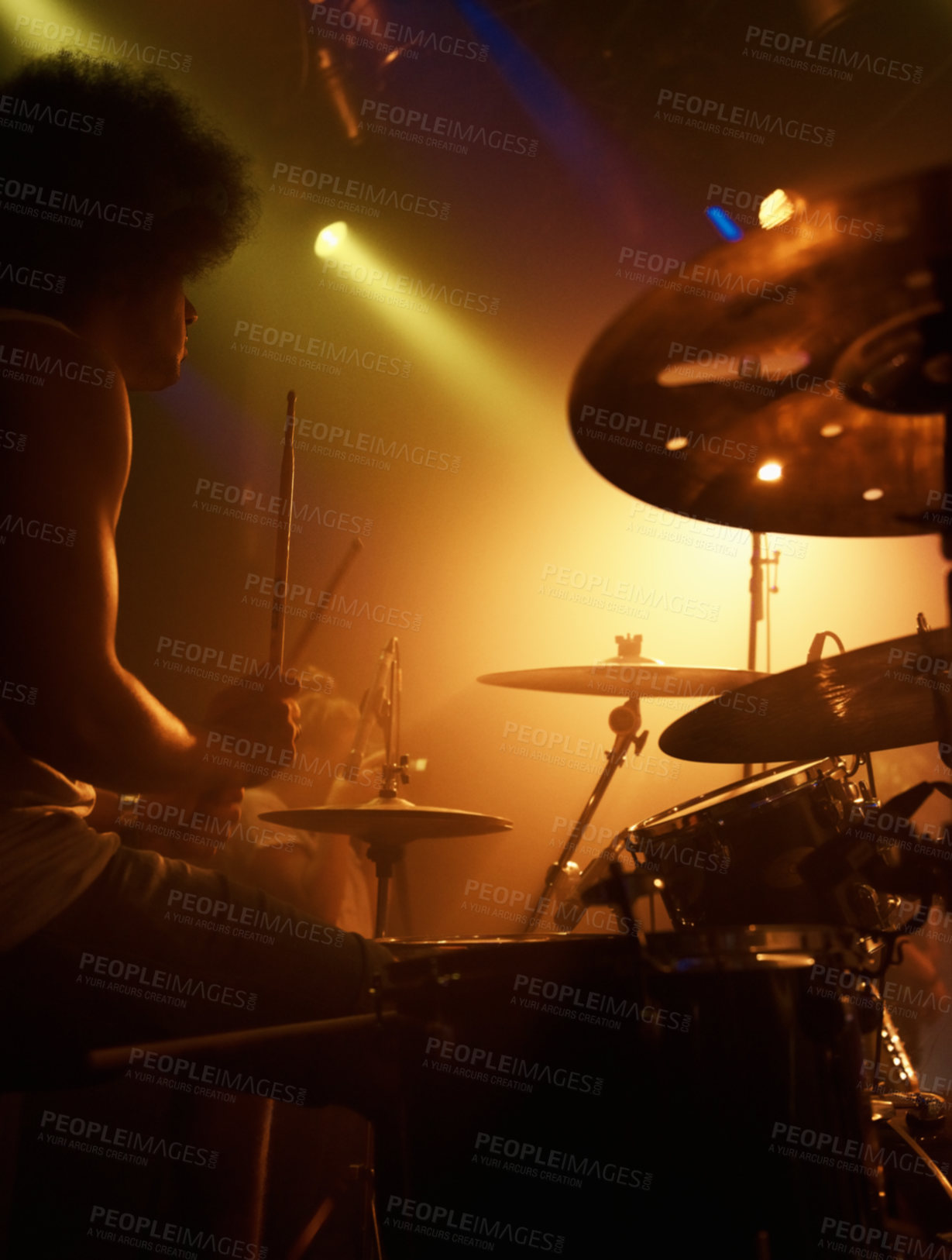 Buy stock photo Stage, drummer and man in performance at concert playing jazz, beat and talent for music. Drums, musician and person in theater spotlight with instrument for percussion, rhythm and show at night