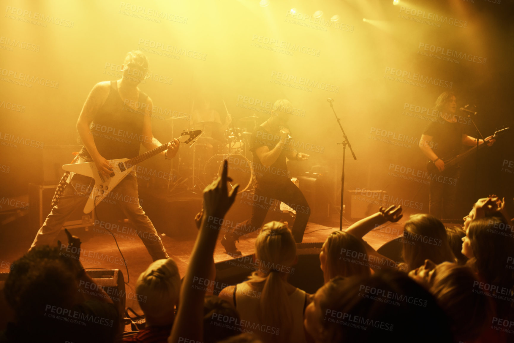 Buy stock photo Music, concert and band on a stage with audience for performance with lighting equipment at party. Event, entertainment and group of musicians at festival, disco or rave with energy for crowd or fans