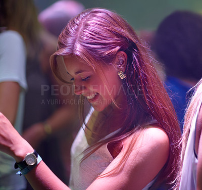 Buy stock photo Woman, happy and dancing at party or club, smiling and entertainment at special event on weekend. Female person, joy and freedom at concert on vacation or holiday, celebrating and music festival