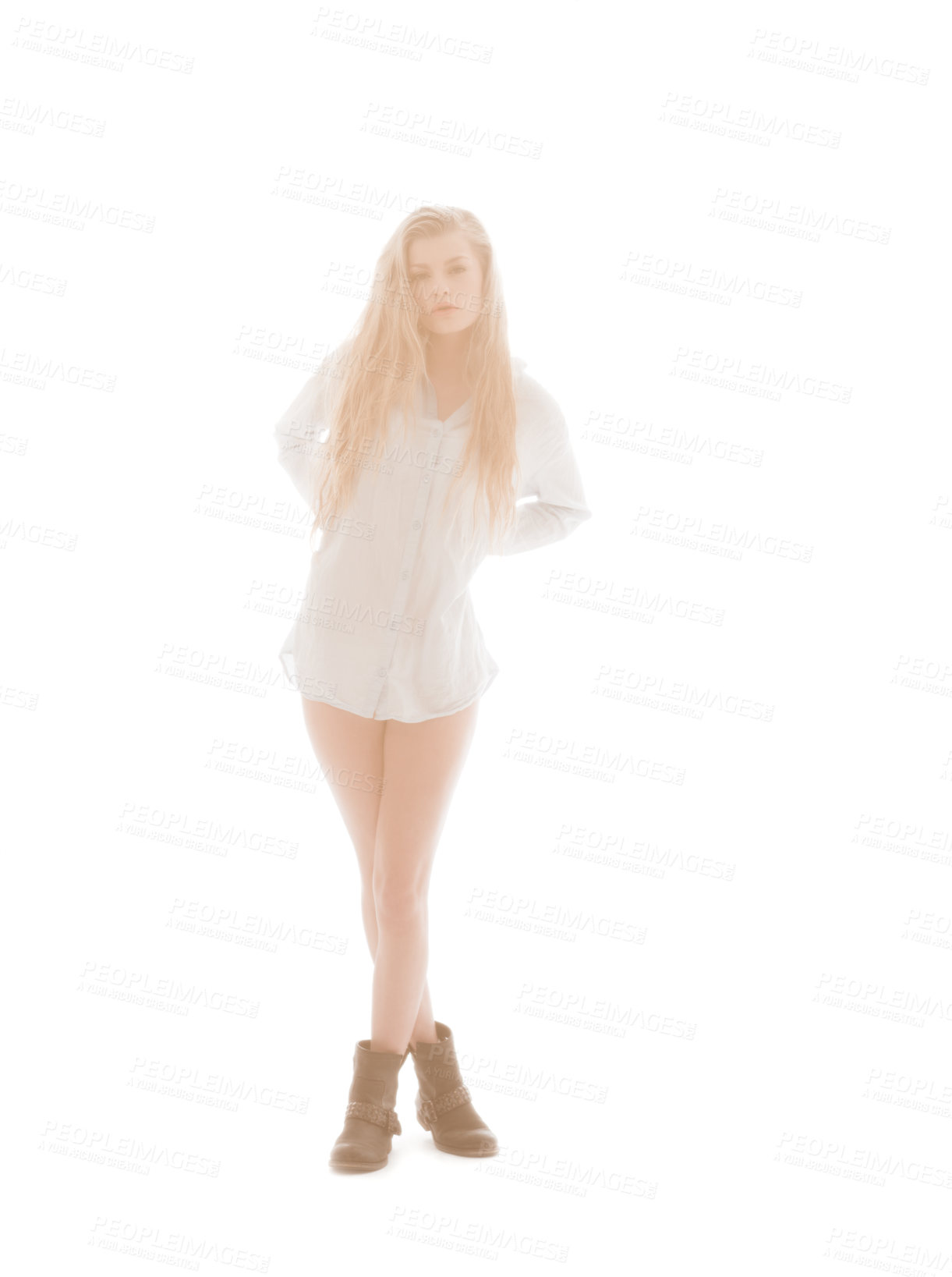 Buy stock photo An ethereal beauty bathed in white light wearing a long sleepshirt