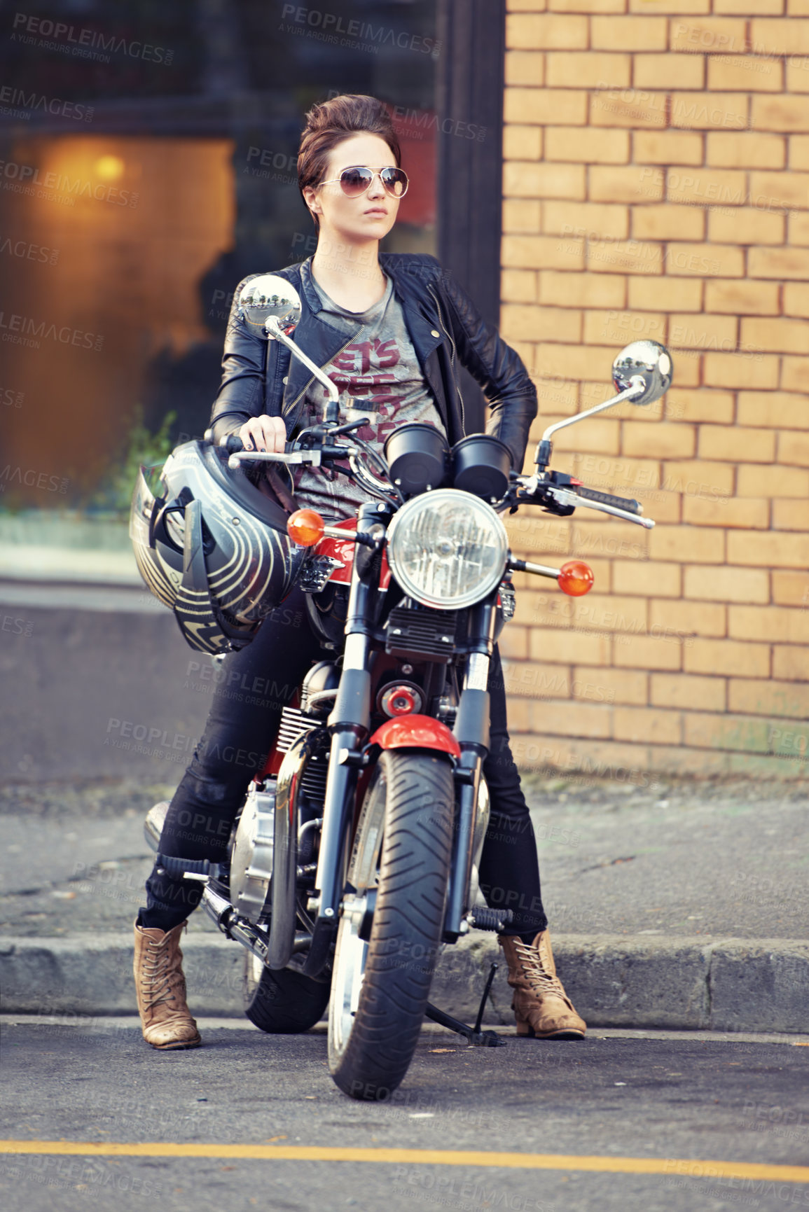 Buy stock photo Motorcycle, leather and woman on street with sunglasses for travel, transport or road trip as rebel. Fashion, city and model with attitude on classic or vintage bike for transportation or journey