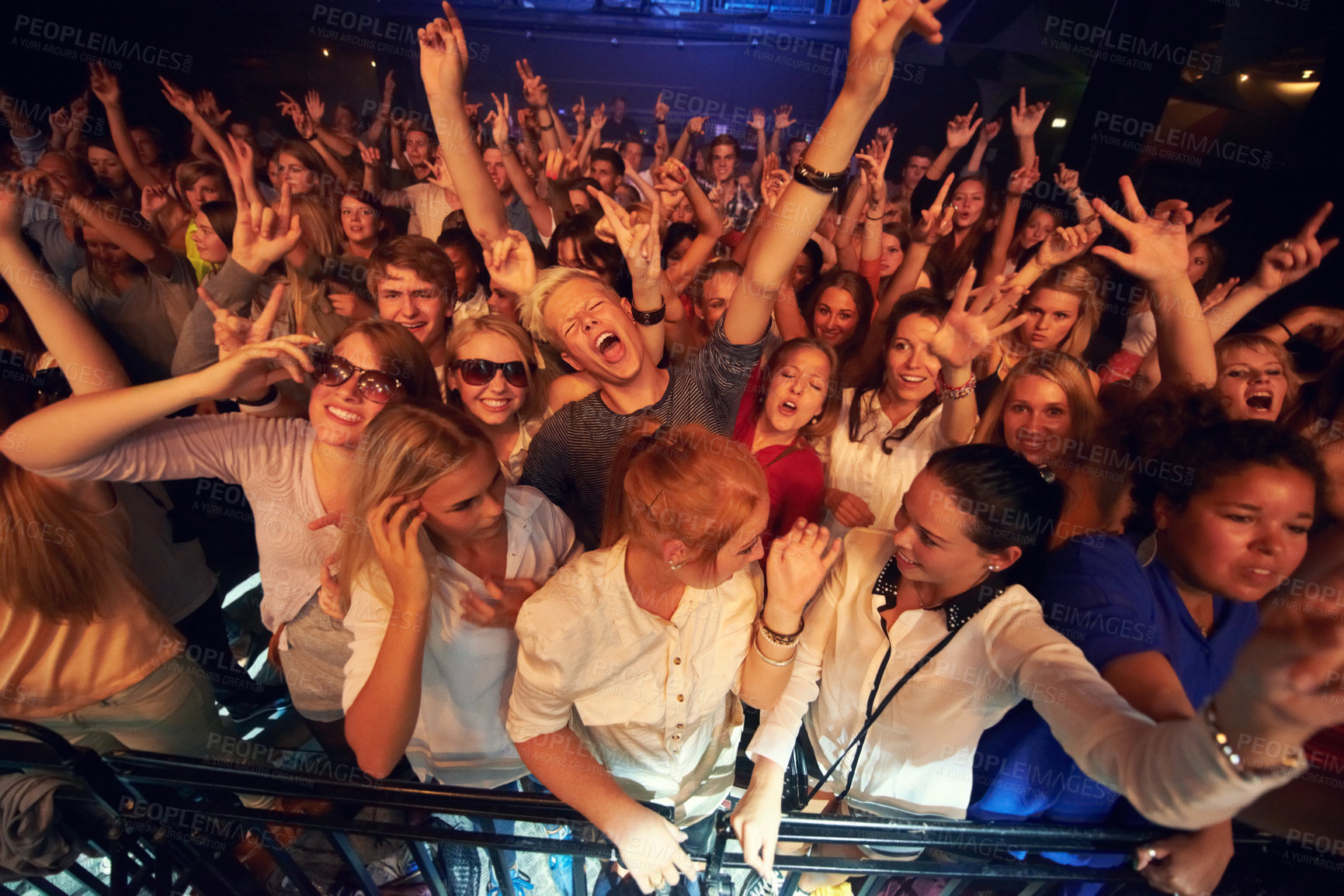 Buy stock photo Party, crowd and music with friends at a concert enjoying a new year celebration or event together from above. Disco, dance and audience with a man and woman friend group dancing in a nightclub