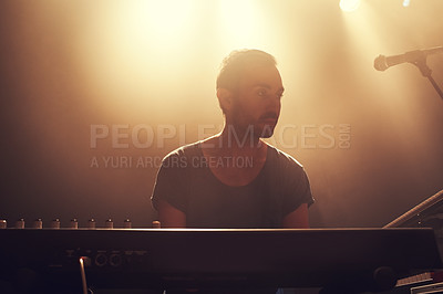 Buy stock photo Musician, keyboard and concert for singing on dark stage, music festival or talent show for entertainment. Professional music artist, focus or dream gig at event, performance or playing by microphone