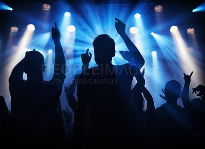 Buy stock photo Silhouette of a crowd of young adults at a concert