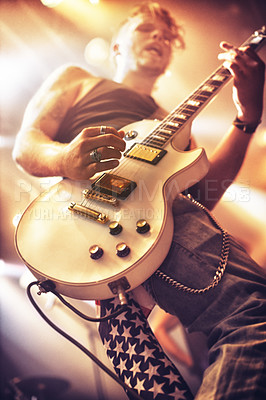 Buy stock photo Guitar, man and stage for rock concert, performance and singing at party, event and celebration in night. Male musician, artist or rockstar with instrument at music festival for art, sound and career