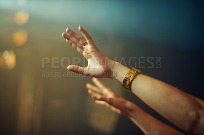 Buy stock photo Cropped shot of a person's hands at a music concert
