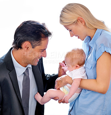 Buy stock photo House, businessman and father with smile for infant, white background and professional with suit. Family, dad and mother with baby, love and parents together for happiness with child in home