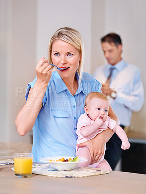 Buy stock photo Woman, breakfast and thinking with baby in morning for daily routine, planning and eating in kitchen. Mother, infant and standing in house with vision, ideas and nurture of child in family home