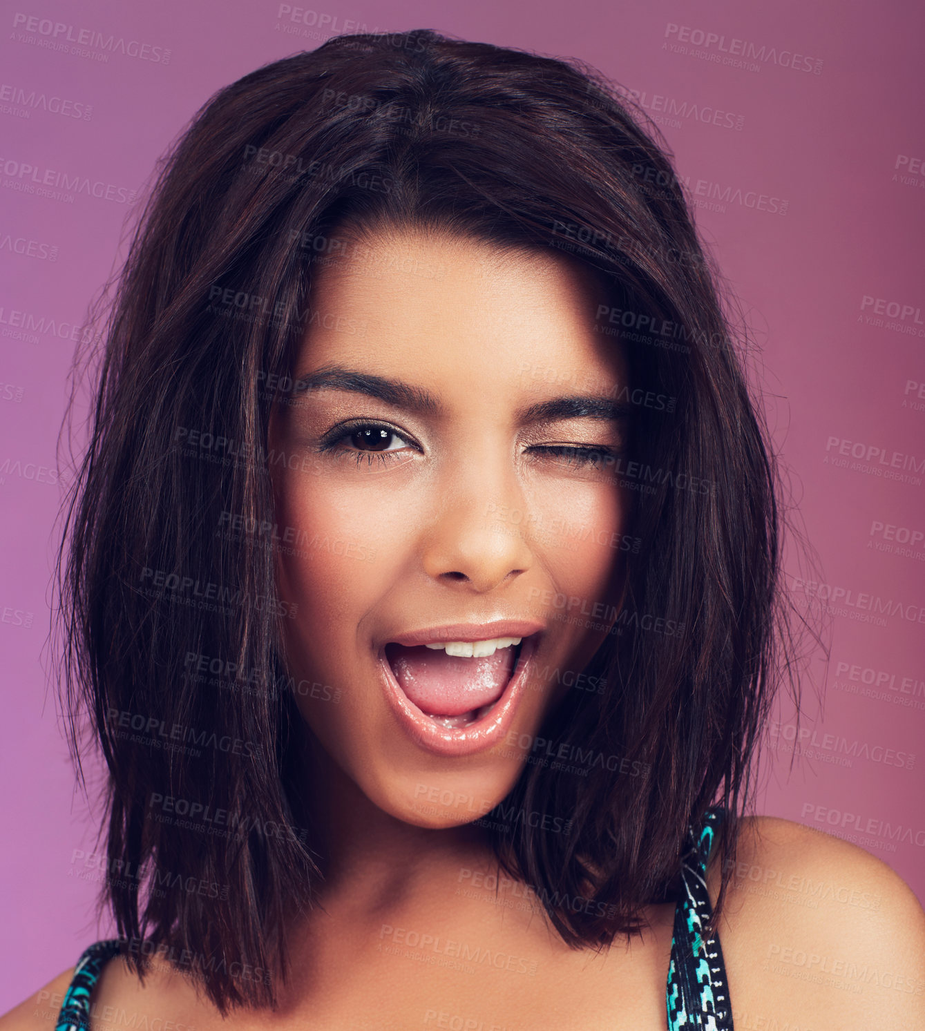 Buy stock photo Studio shot of a beautiful young woman posing against a colorful background