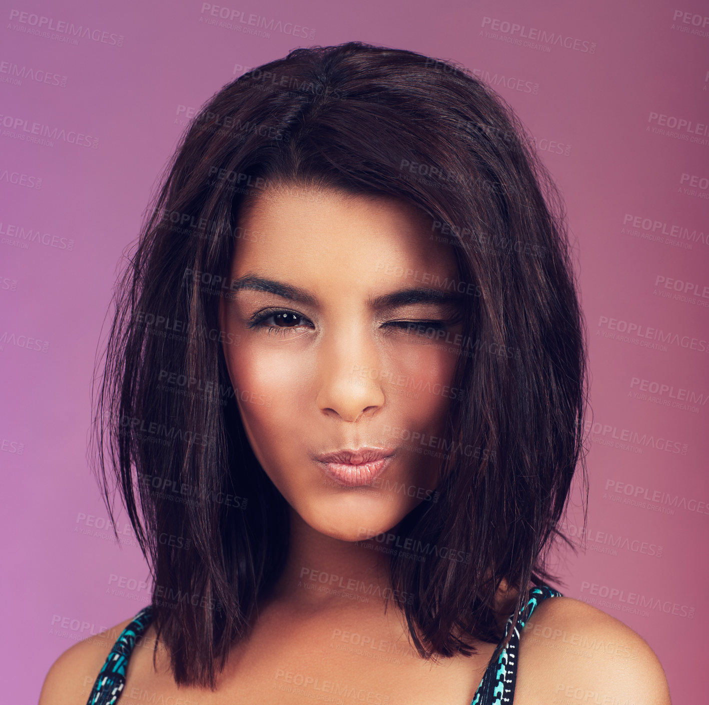 Buy stock photo Studio, woman and makeup with wink, portrait and youth for beauty, model and individuality. Latino person, pink background and hairstyle for modern, hipster and cool with trendy, smile and confidence