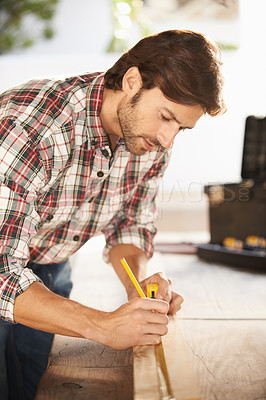 Buy stock photo Man, carpenter and desk with wood, thinking and building for renovation, repair and maintenance. Craftsman, handyman and contractor with diy, craft and artisan for woodwork, home improvement or work 