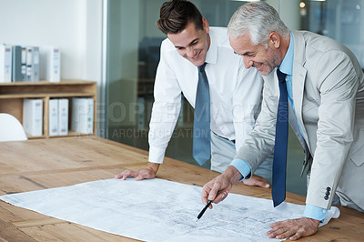 Buy stock photo CEO, businessman and architect with building layout, plan and vision for expanding in office for space. Executive, employer and designer at desk, company and meeting for blueprint idea in project