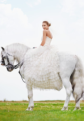 Buy stock photo Wedding, woman and portrait with riding horse or happy for celebration, marriage and confidence in countryside. Bride, person and stallion on lawn in field with smile, dress and animal at ceremony