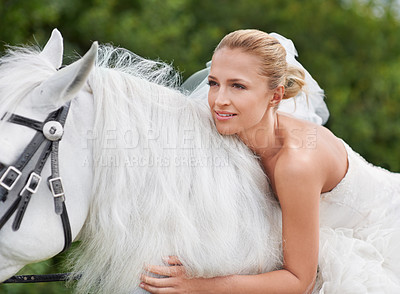 Buy stock photo Wedding, woman and riding with horse in nature and happy for celebration, marriage and confidence in countryside. Bride, person and stallion on lawn in field with smile, dress and animal at ceremony