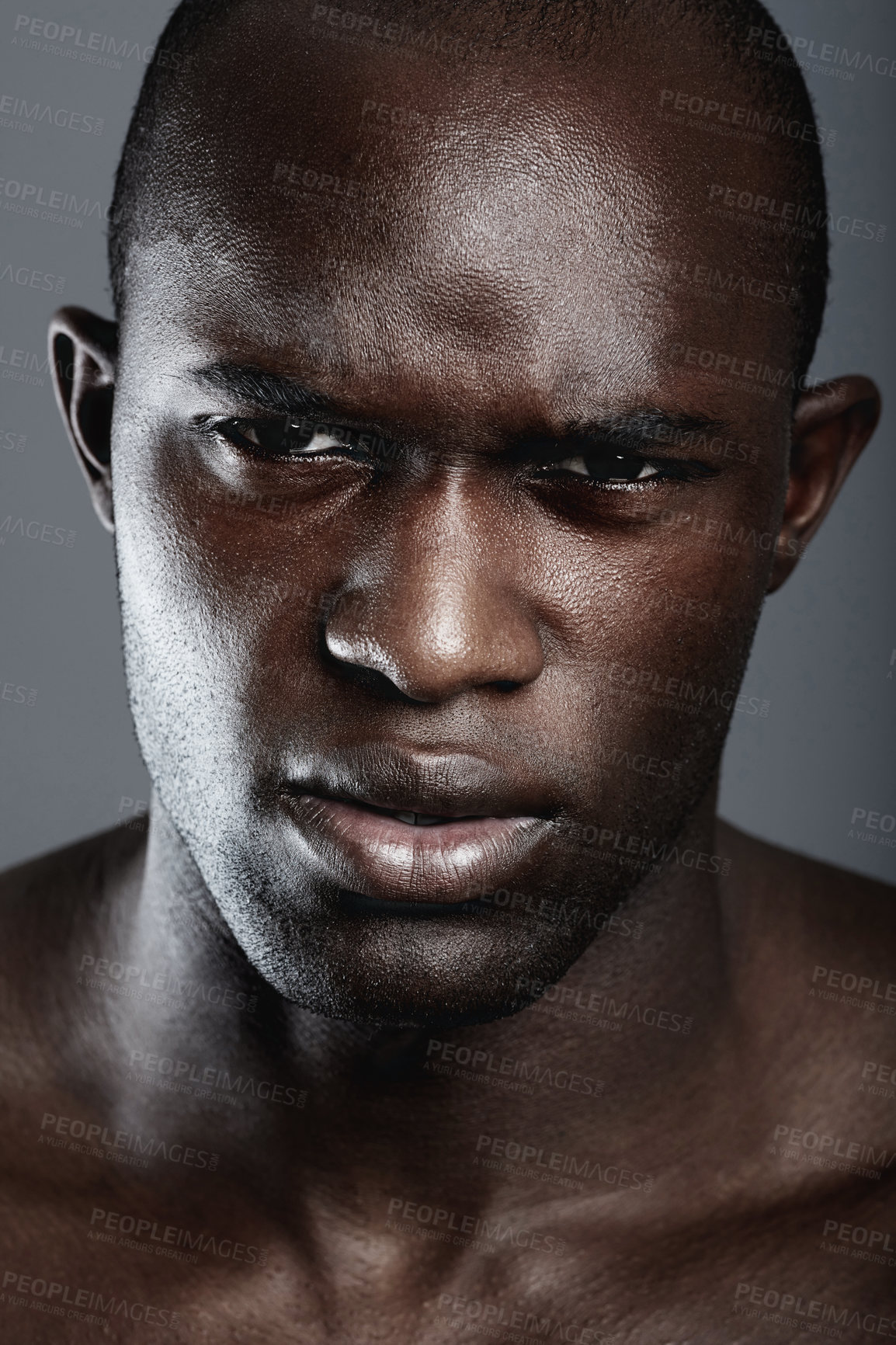 Buy stock photo Portrait , serious and black man with skincare, cosmetics and dermatology against a grey studio background. Face, male person and model with beauty, salon treatment and luxury with grooming routine