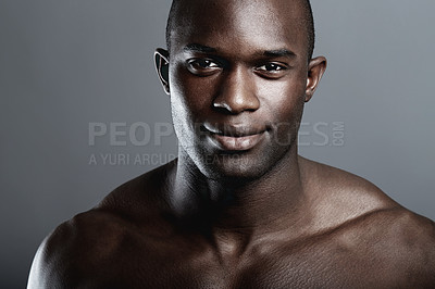 Buy stock photo Portrait of a handsome young african man in studio