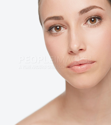 Buy stock photo Portrait, beauty and skincare of woman in makeup, shine or glow isolated on white studio background. Face, serious and young model in cosmetics, dermatology and spa facial treatment for healthy skin