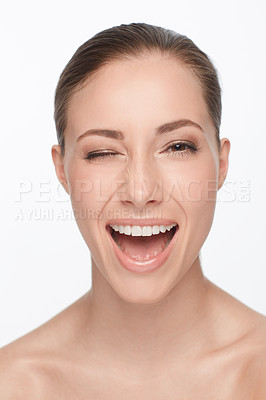 Buy stock photo Portrait, smile and woman wink for skincare, flirt or beauty makeup isolated on white studio background. Face, blink and happy model in cosmetics excited for spa facial treatment for healthy skin