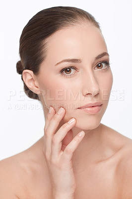 Buy stock photo Woman, hand on face and skincare for natural beauty, hygiene and wellness with dermatology and self care on white background. Portrait, facial and touching skin, glow and cosmetics in studio
