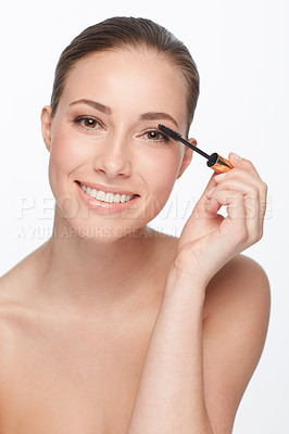 Buy stock photo Mascara, portrait and woman with makeup for beauty, cosmetic product for lashes and volume on white background. Wand, eyelash care with smile and skin glow, change or transformation in studio