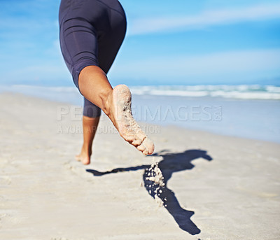 Buy stock photo Person, running and feet at beach with exercise, sport and training for marathon by the sea. Workout, fitness and back of a athlete with health and wellness outdoor of runner with cardio in summer