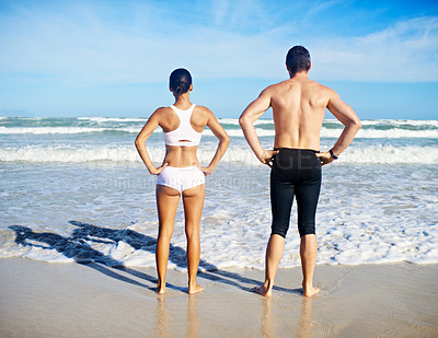 Buy stock photo Couple, sea and fitness with swimming, training and exercise for race in summer by the beach. Back, athlete and workout of people by the ocean in Miami for health and wellness outdoor for sport